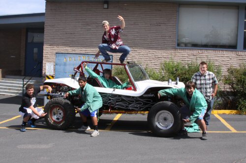 students on dune buggy